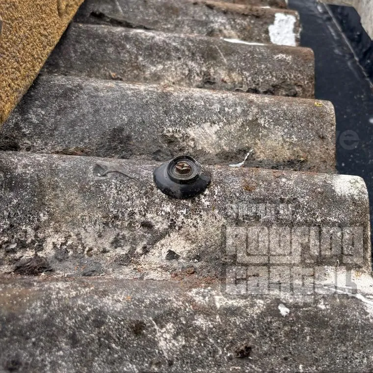 **Bolt Head Corrosion:** Weather exposure causes fixings to deteriorate, creating entry points for water. These seemingly minor issues require immediate roof patching to prevent extensive damage. Corroded bolt heads causing roof leaks