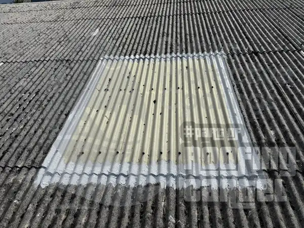 Lava 20 waterproof coating applied around rooflight frames on asbestos roof