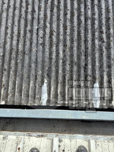 Professional asbestos roof crack repair in Ireland using hand-applied LAVA 20 waterproofing system