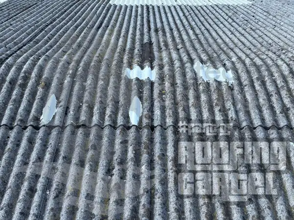 Completed Lava 20 patch repair on asbestos roof demonstrating UV stable finish