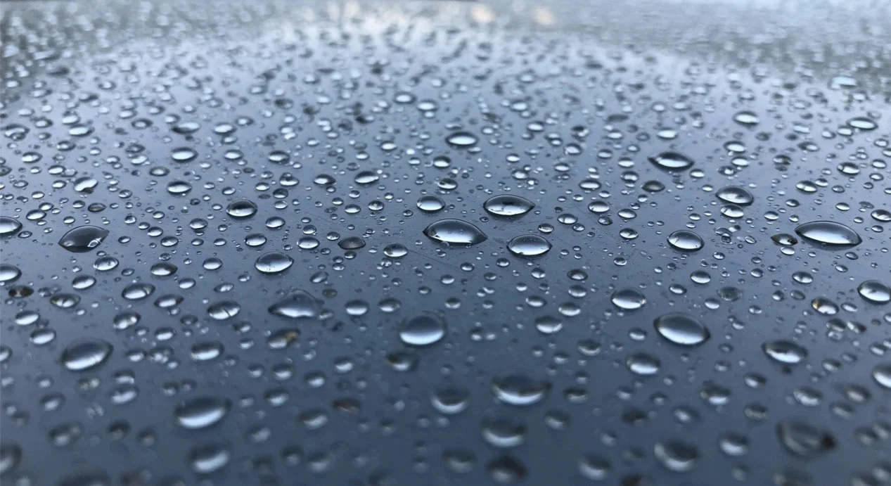 Advanced Lava 20 waterproofing technology applied to industrial asbestos roof surface showing UV-stable topcoat finish